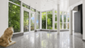 Glasfront mit Blick ins Grüne